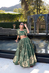 DAZZLING BOTTLE GREEN FLORAL PRINTED SILK CROP TOP LEHENGA WITH JACKET