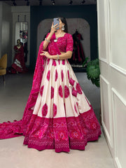DESIRABLE RANI PINK BANDHANI PRINTED TUSSAR SILK FUNCTION WEAR LEHENGA CHOLI