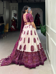 STRIKING WINE COLOR BANDHANI PRINTED TUSSAR SILK EVENT WEAR LEHENGA CHOLI