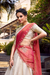 ENCHANTING OFF-WHITE ZARI WEAVING JACQUARD FESTIVAL WEAR LEHENGA CHOLI