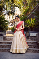 ENCHANTING OFF-WHITE ZARI WEAVING JACQUARD FESTIVAL WEAR LEHENGA CHOLI