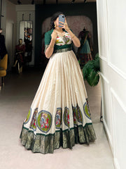 Green Color Kalamkari Print With Zari Weaving Border Dola Silk Gown