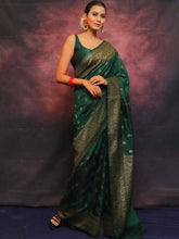 ADORNING DARK GREEN SOFT SILK SAREE WITH PROMINENT BLOUSE PIECE