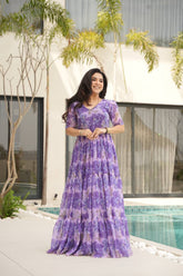 LAVISHING PURPLE FLORAL PRINTED GEORGETTE FESTIVAL WEAR GOWN