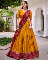 ELEGANT YELLOW SILK BANDHANI PRINTED HALDI WEAR LEHENGA CHOLI