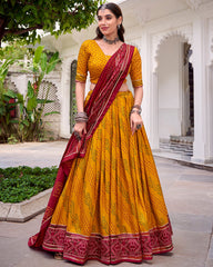 ELEGANT YELLOW SILK BANDHANI PRINTED HALDI WEAR LEHENGA CHOLI