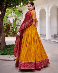 ELEGANT YELLOW SILK BANDHANI PRINTED HALDI WEAR LEHENGA CHOLI