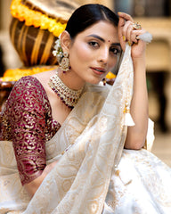 SNAPPY OFF WHITE SOFT SILK SAREE WITH TRANSCENDENT BLOUSE PIECE