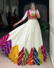 AWESOME WHITE RAYON NAVRATRI LEHENGA CHOLI WITH MULTICOLOR BORDER