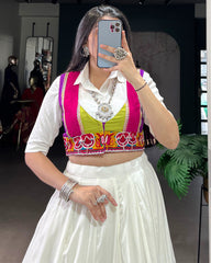 AWESOME WHITE RAYON NAVRATRI LEHENGA CHOLI WITH MULTICOLOR BORDER