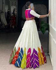 AWESOME WHITE RAYON NAVRATRI LEHENGA CHOLI WITH MULTICOLOR BORDER