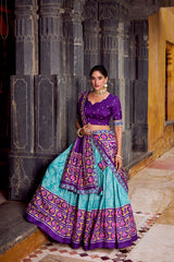 MESMERIZING SKY BLUE SILK IKKAT PRINTED FESTIVAL WEAR LEHENGA CHOLI