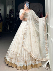 Enchanting Off-White Foil Work Silk Festive Wear Lehenga Choli With Dupatta