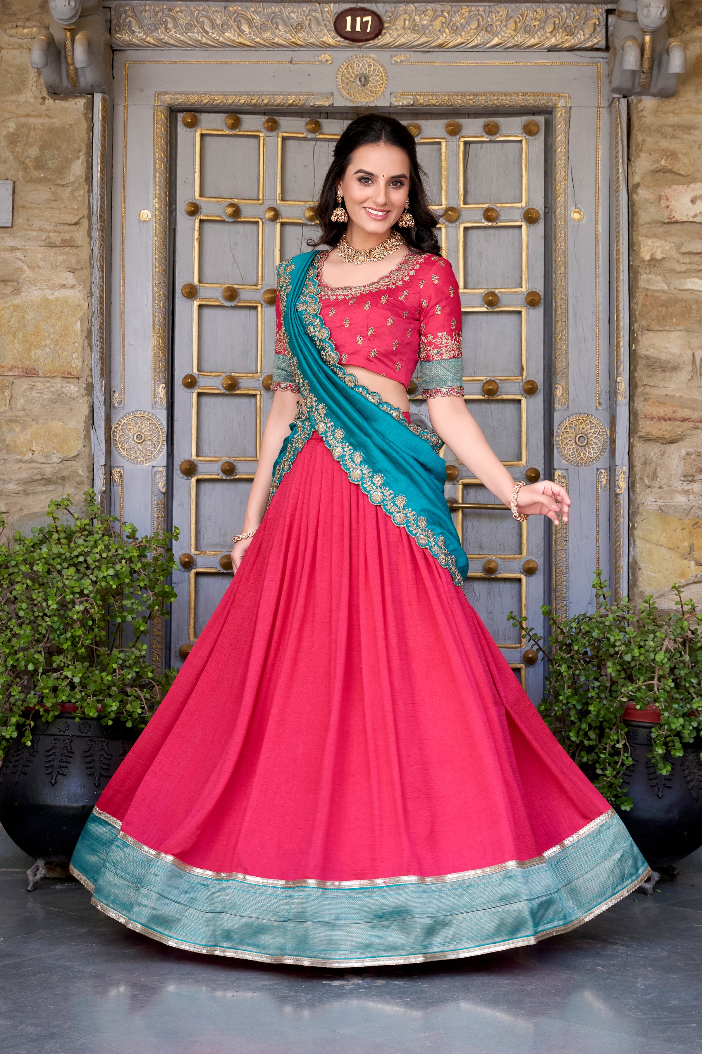 CAPRICIOUS BLUSH PINK ZARI WEAVING BORDER VICHITRA SILK HALF SAREE LEHENGA BY MITVAL
