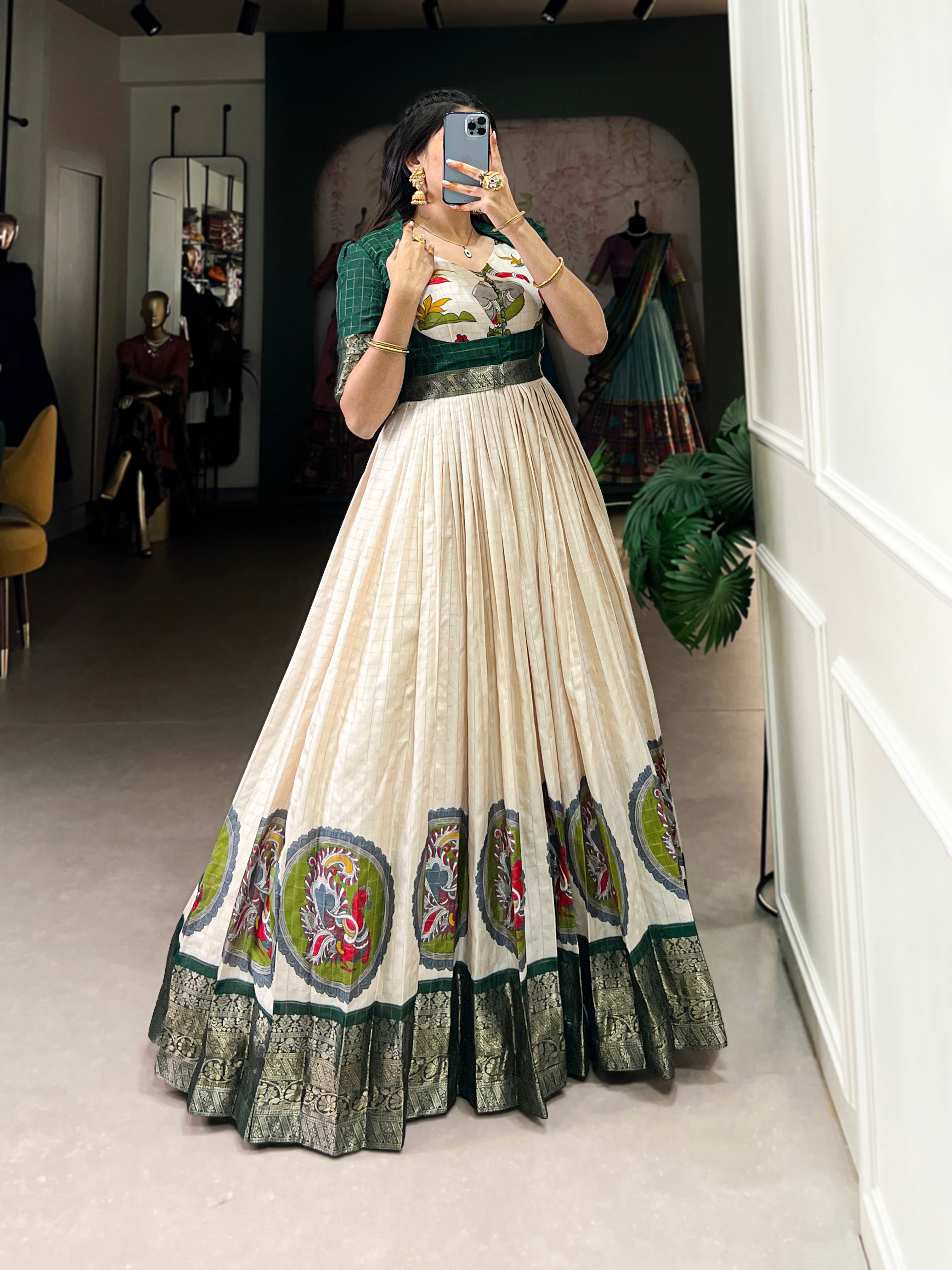 Green Color Kalamkari Print With Zari Weaving Border Dola Silk Gown