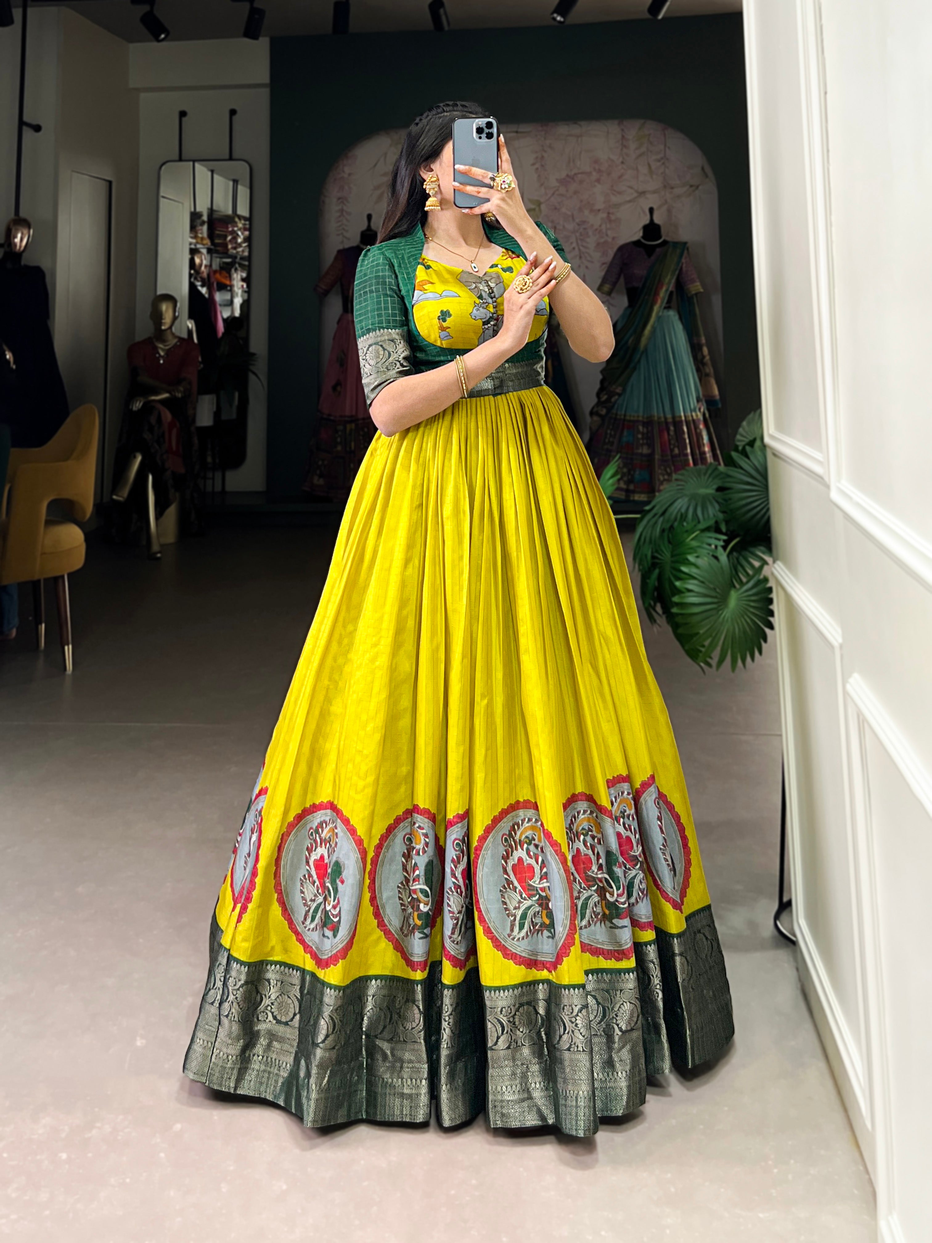 Parrot Color Kalamkari Print With Zari Weaving Border Dola Silk Gown