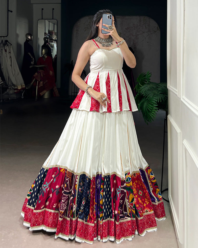 GRACEFUL WHITE NAVRATRI LEHENGA CHOLI WITH TRADITIONAL PRINTS