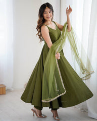 STRIKING GREEN CHANDERI SILK LACE WORK FESTIVE WEAR ANARKALI SUIT