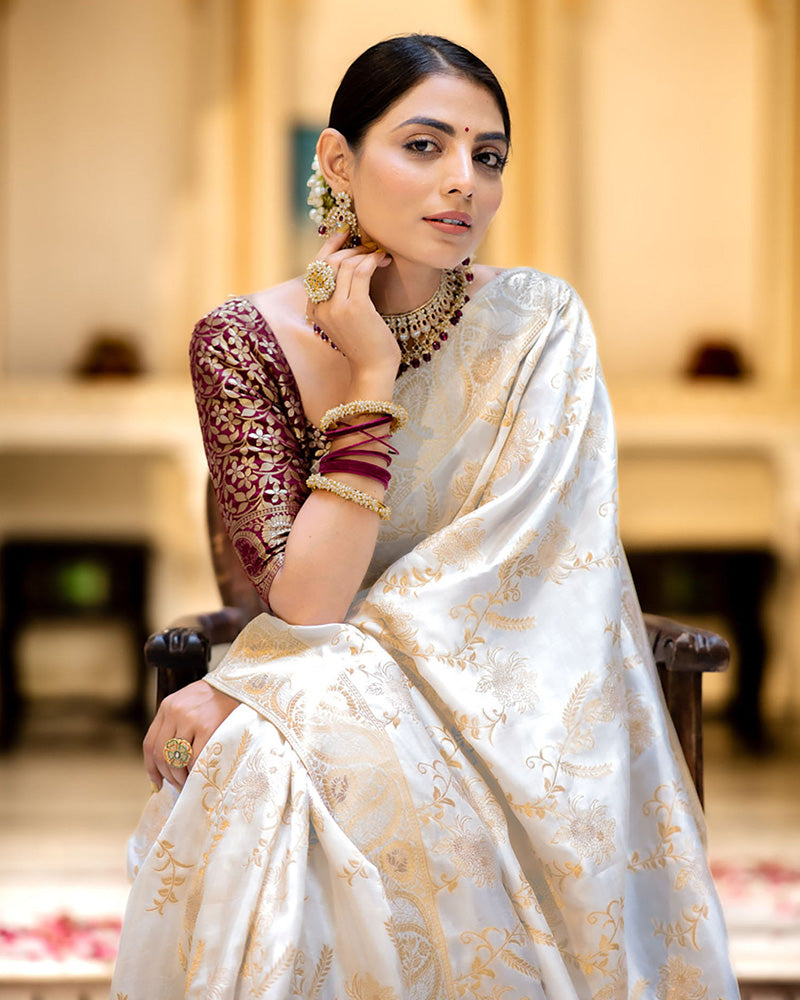 SNAPPY OFF WHITE SOFT SILK SAREE WITH TRANSCENDENT BLOUSE PIECE