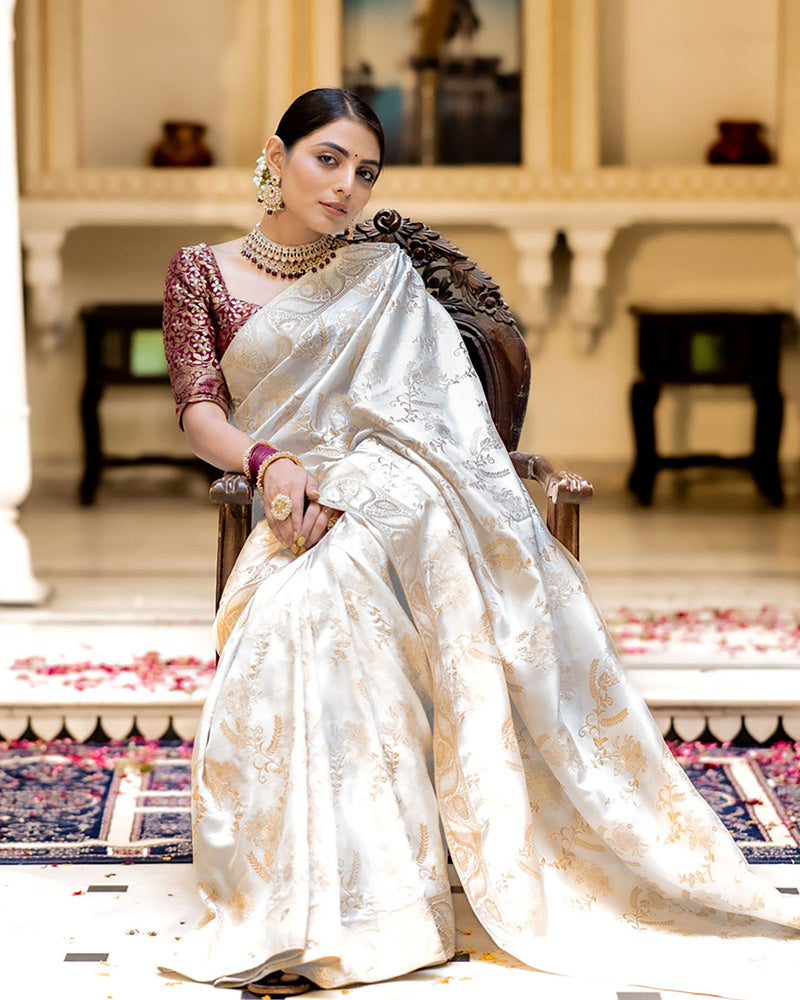SNAPPY OFF WHITE SOFT SILK SAREE WITH TRANSCENDENT BLOUSE PIECE