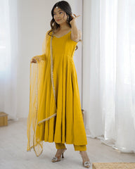 MAJESTIC YELLOW CHANDERI SILK LACE WORK FESTIVE WEAR ANARKALI SUIT
