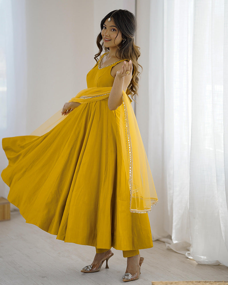 MAJESTIC YELLOW CHANDERI SILK LACE WORK FESTIVE WEAR ANARKALI SUIT