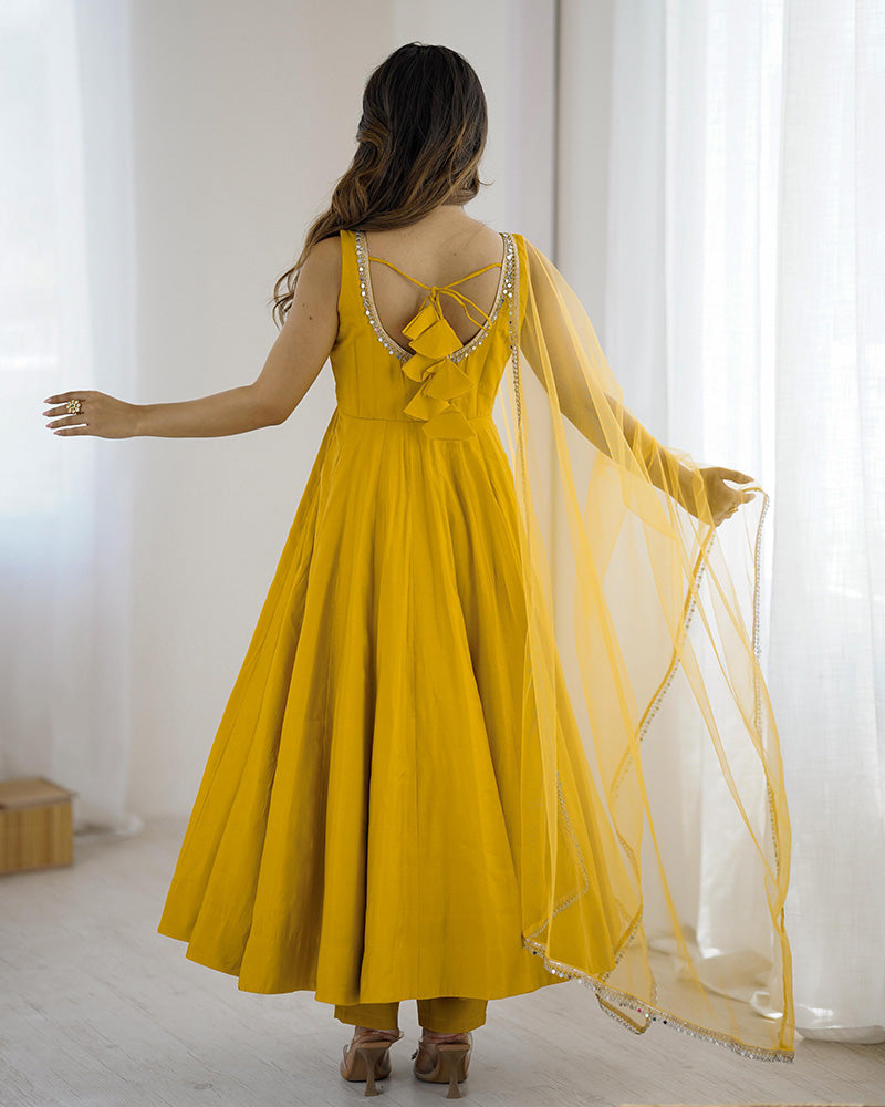 MAJESTIC YELLOW CHANDERI SILK LACE WORK FESTIVE WEAR ANARKALI SUIT