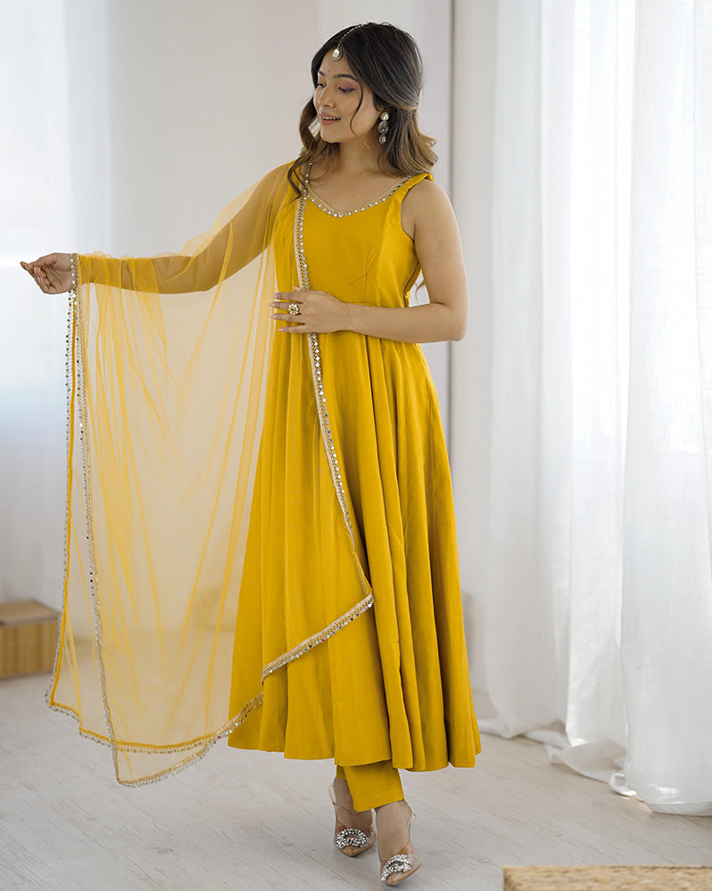 MAJESTIC YELLOW CHANDERI SILK LACE WORK FESTIVE WEAR ANARKALI SUIT