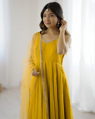 MAJESTIC YELLOW CHANDERI SILK LACE WORK FESTIVE WEAR ANARKALI SUIT