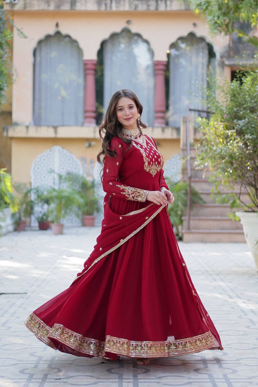 Attractive Maroon Color Faux Blooming Georgette With Rich Sequins Embroidered Work Designer Gown