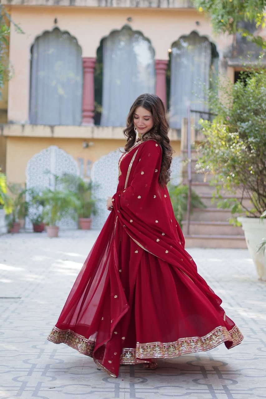 Attractive Maroon Color Faux Blooming Georgette With Rich Sequins Embroidered Work Designer Gown