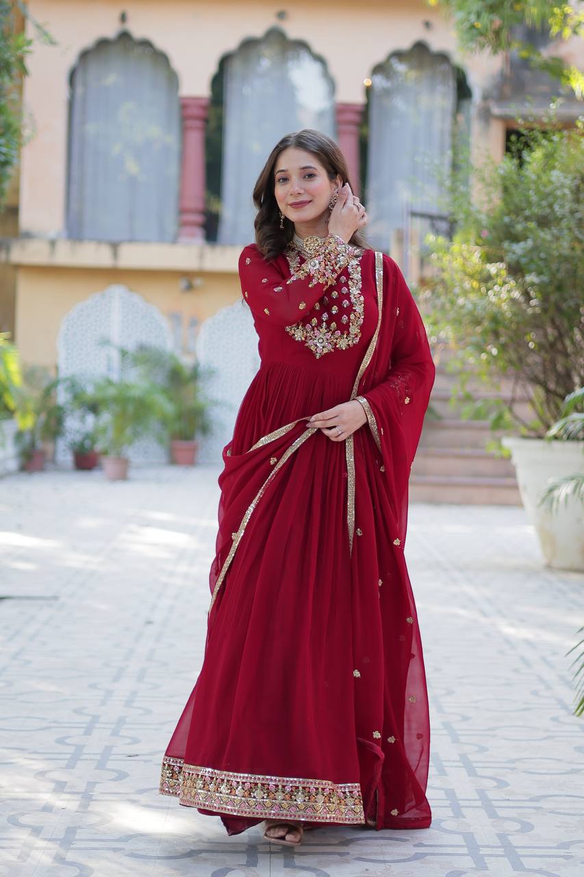 Attractive Maroon Color Faux Blooming Georgette With Rich Sequins Embroidered Work Designer Gown