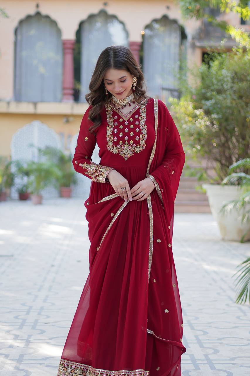 Attractive Maroon Color Faux Blooming Georgette With Rich Sequins Embroidered Work Designer Gown