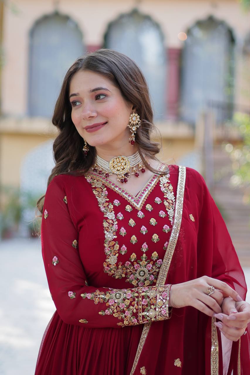 Attractive Maroon Color Faux Blooming Georgette With Rich Sequins Embroidered Work Designer Gown